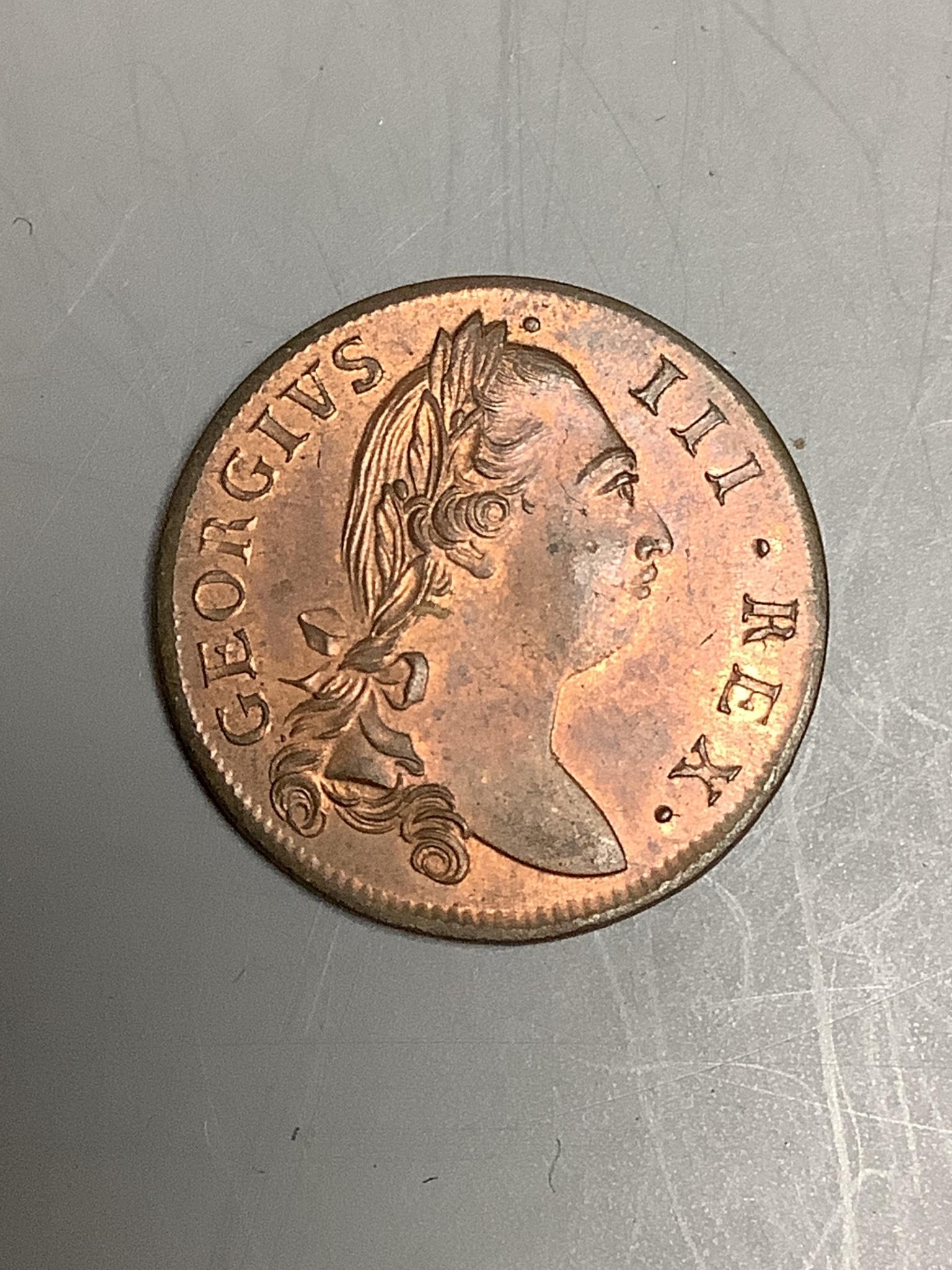 Ireland coins, a George III Irish Halfpenny, 1775, Type III, laureate bust with long hair, rev. crowned harp (DF 584; S.6614), weakness to edge otherwise about uncirculated, with some original lustre